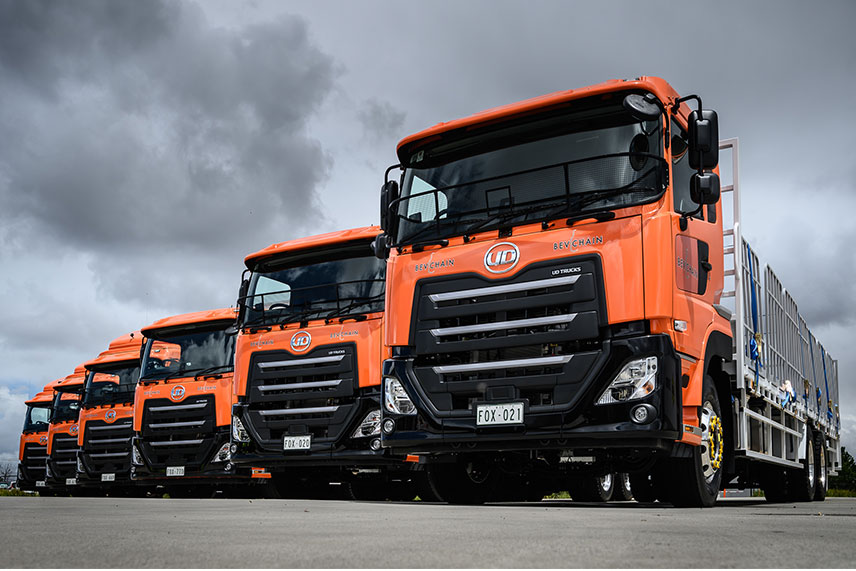 UD Trucks has completed a handover of more than 90 Quon CD 25 360 vehicles to Linfox Logistics Australia and New Zealand. The fleet will be allocated to its bespoke beverage logistics brand, BevChain.   The fleet investment demonstrates Linfox’s long-term commitment to operating the newest, safest and most environmentally friendly fleet on the road.   The Quon features a host of advanced safety features including the Traffic Eye Brake System, electronic braking systems, UD Stability Control, and Lane Departure Warning as well pPNLT exhaust emissions standard, which is comparable to Euro 6.  Linfox Executive Chairman, Peter Fox said, “An efficient, safe and modern fleet ensures the reliability of our customers’ supply chains.”    “We regularly review and upgrade our fleet to take advantage of new technology for the benefit of our customers, our drivers and the people we share the roads with every day.”  Linfox worked closely with UD Trucks to source a fleet that met the specific needs of BevChain’s customers.  “BevChain rely on a range of vehicles from heavy rigids, trailers and flatbed trucks to transport beverage products to various delivery points including pubs, bottle shops and customer distribution centres.  “Fittingly, the vehicles incorporate products manufactured by two of our valued customers – the livery is DuluxGroup paints and the tyres are Goodyear Australia,” said Peter.   “The distinctively-branded vehicles will operate on behalf of Linfox’s BevChain customers in New South Wales, Victoria, Queensland and Western Australia.”  Linfox’s own FoxTrax safety technology will also be installed, which features a driver pre-trip inspection including fitness for duty, safe load constraint and vehicle condition checklists as well as electronic driver fatigue management.  linfox   Chairman of UD Trucks, Joachim Rosenberg said: “Our relationship with Linfox spans many countries throughout Oceania and Asia and we are very proud to celebrate such an important partnership for UD Trucks in Australia.”  “We are commi