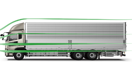 Silver truck with green airflow lines over and around it, side view.