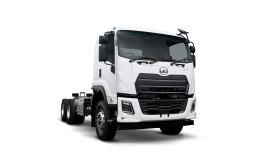 White cab-over truck with empty chassis on a plain white background.